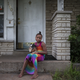 Shakira Pope, 8, an elementary school student, holds her dog.